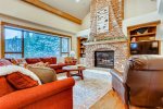 The Breck Haus - Great room with stone fireplace 